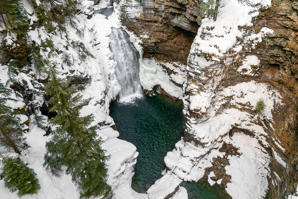 An overhead view of the Marysville Falls in Winter in Kimberley BC